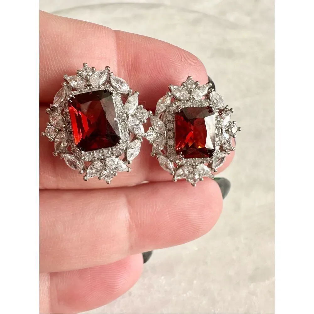 Ruby red cubic zirconia regal style stud earrings
